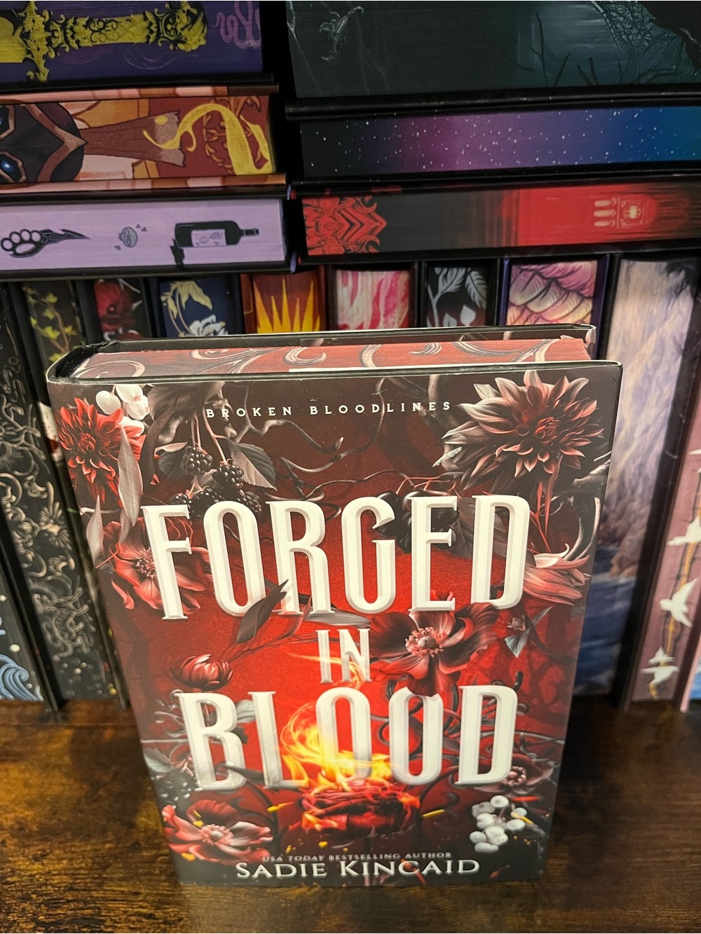 Forged in Blood by Sadie Kincaid - Red Decorative Hardcover Home Accent